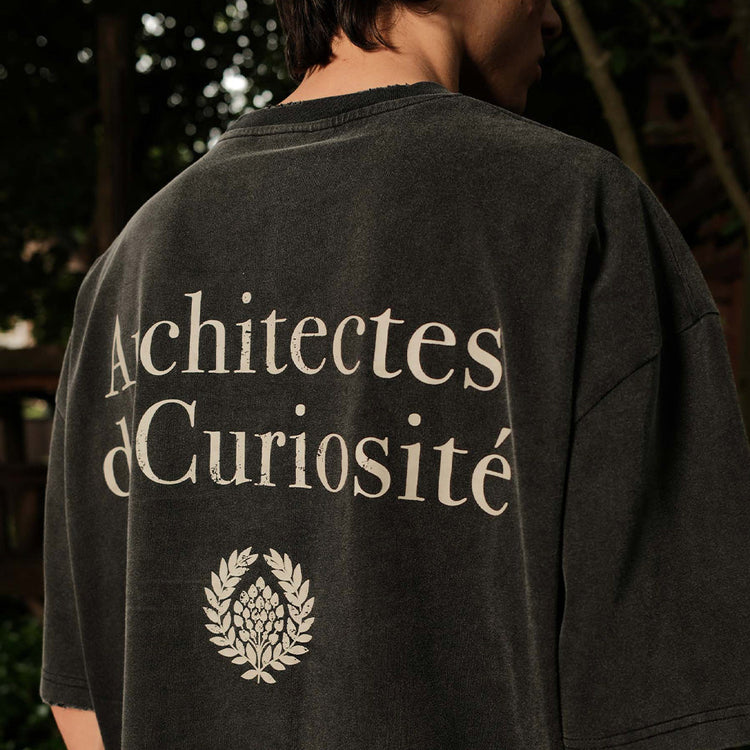 Close up van Don't Waste Culture t-shirt, backprint. Gedragen door model.