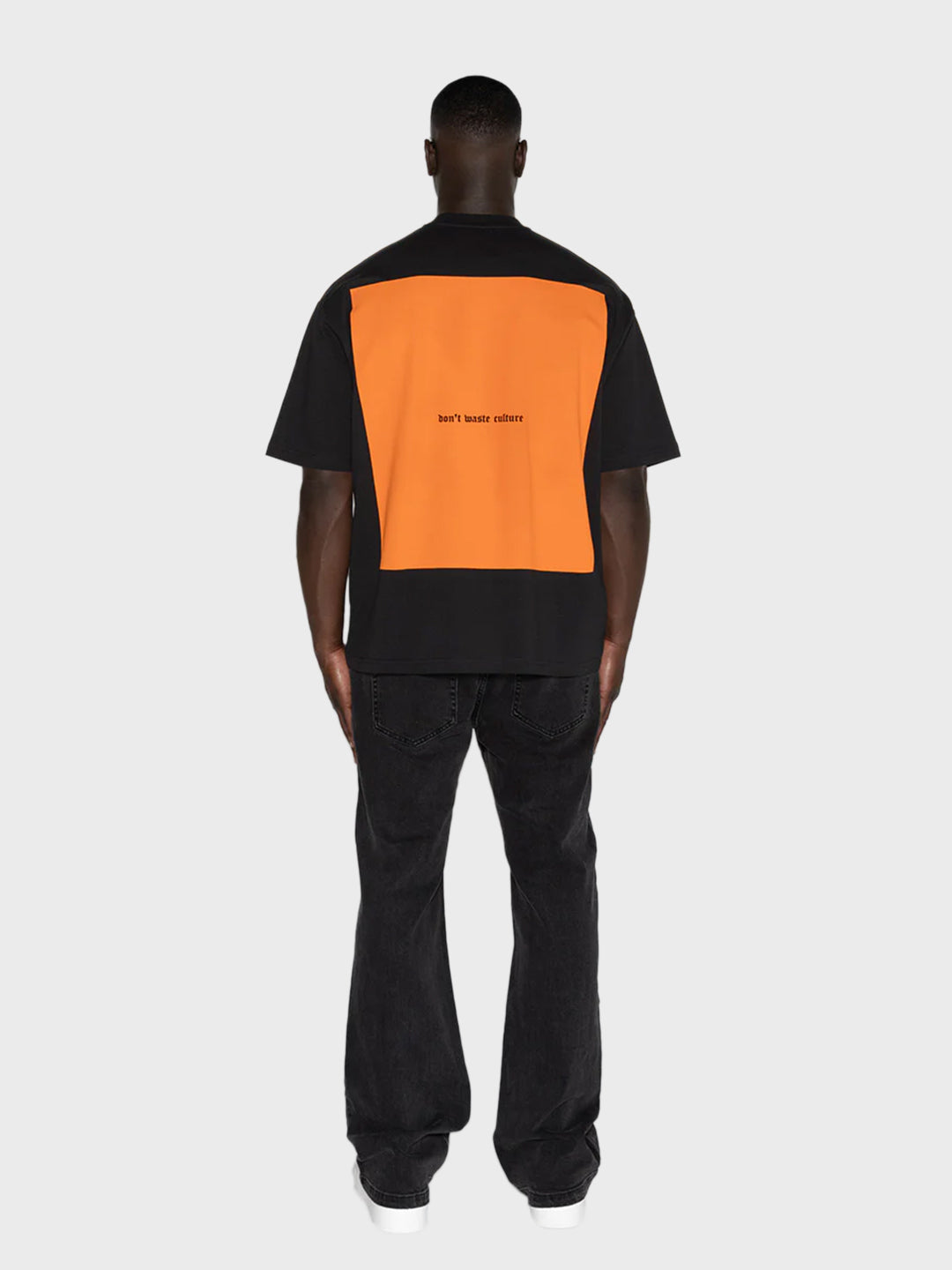 don't waste culture t-shirt zwart oranje