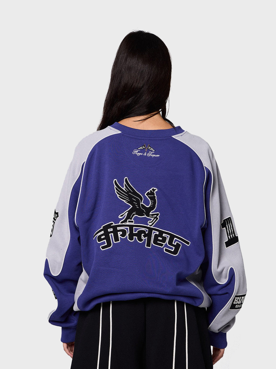 Grimey Race War Crewneck Sweater Blue – model achterkant