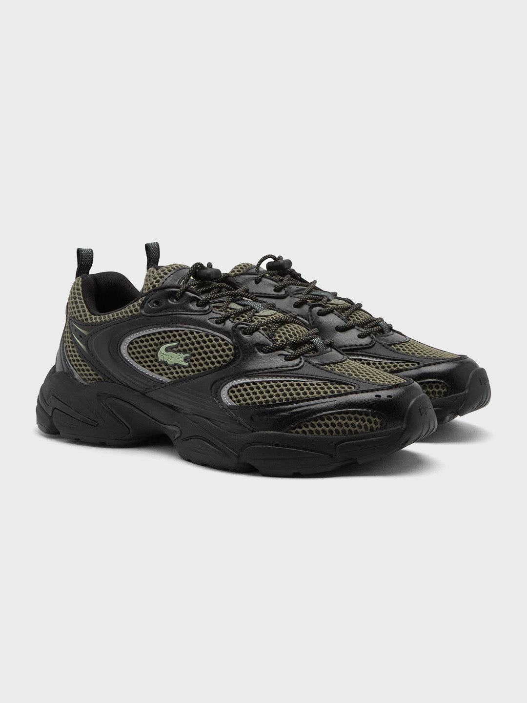 Lacoste Storm 96 sneaker in zwart/groen, schuin vooraanzicht