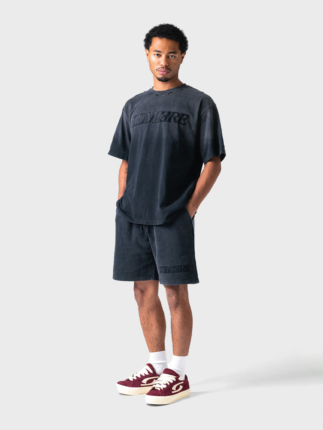 Set met zwarte Lumi3re shorts en T-shirt