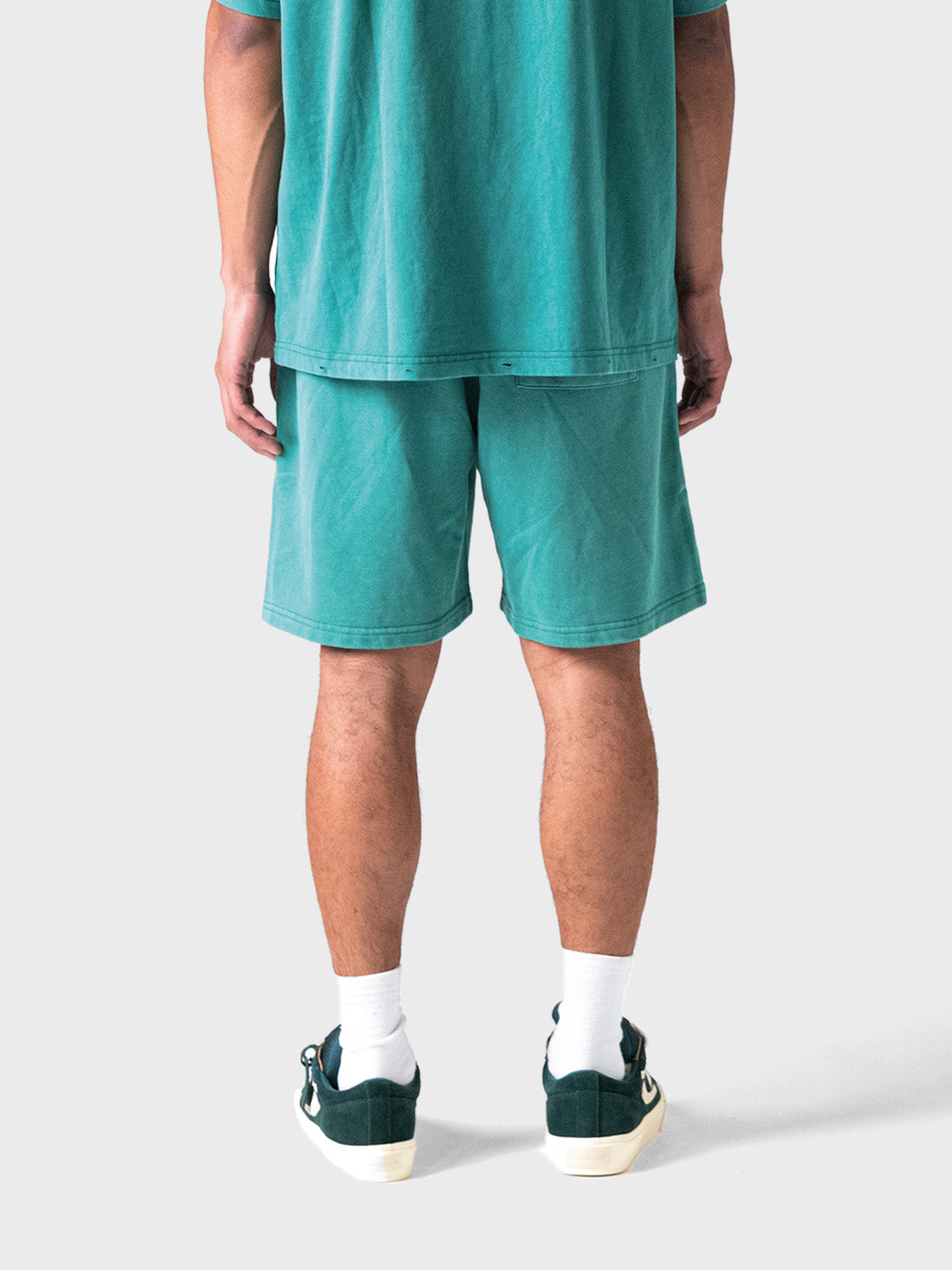 Achterzijde van de Lumi3re shorts in Washed Green