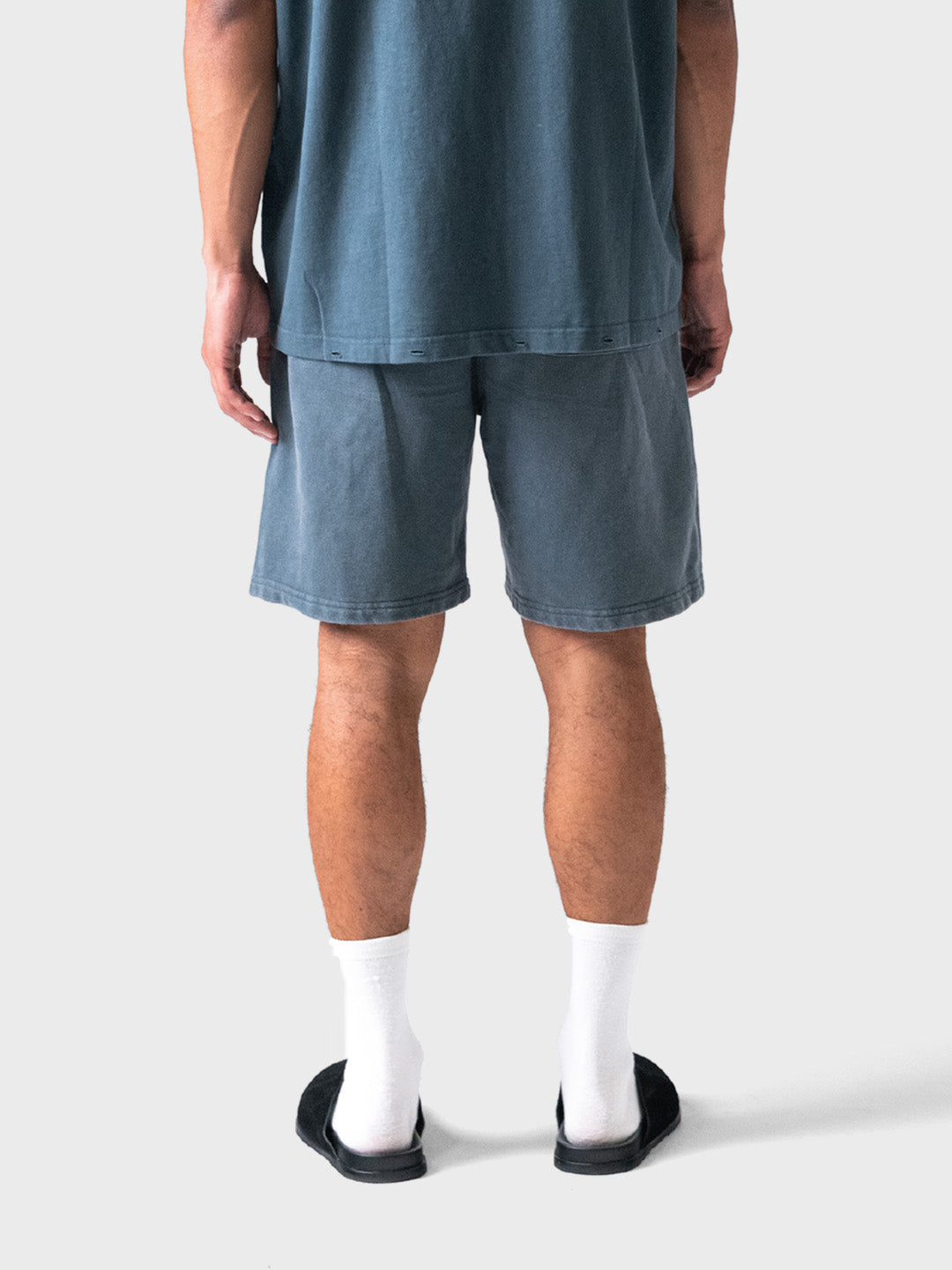 Achterkant van de Lumi3re shorts in Washed Grey