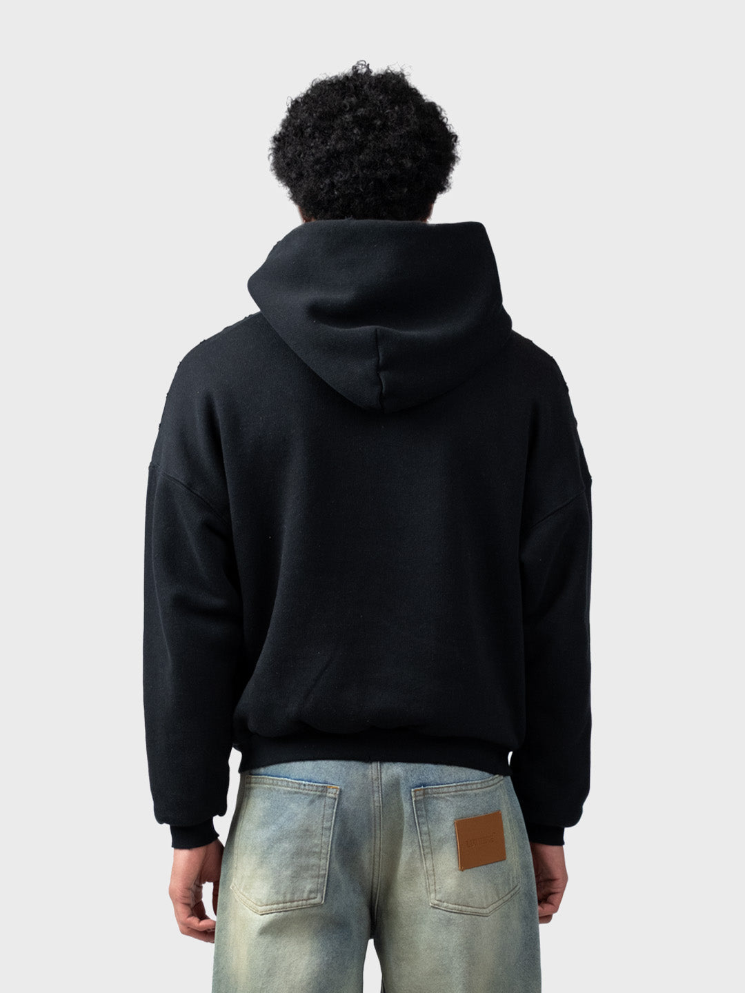 Lumi3re Vintage Wave Hoodie Black – model achterkant