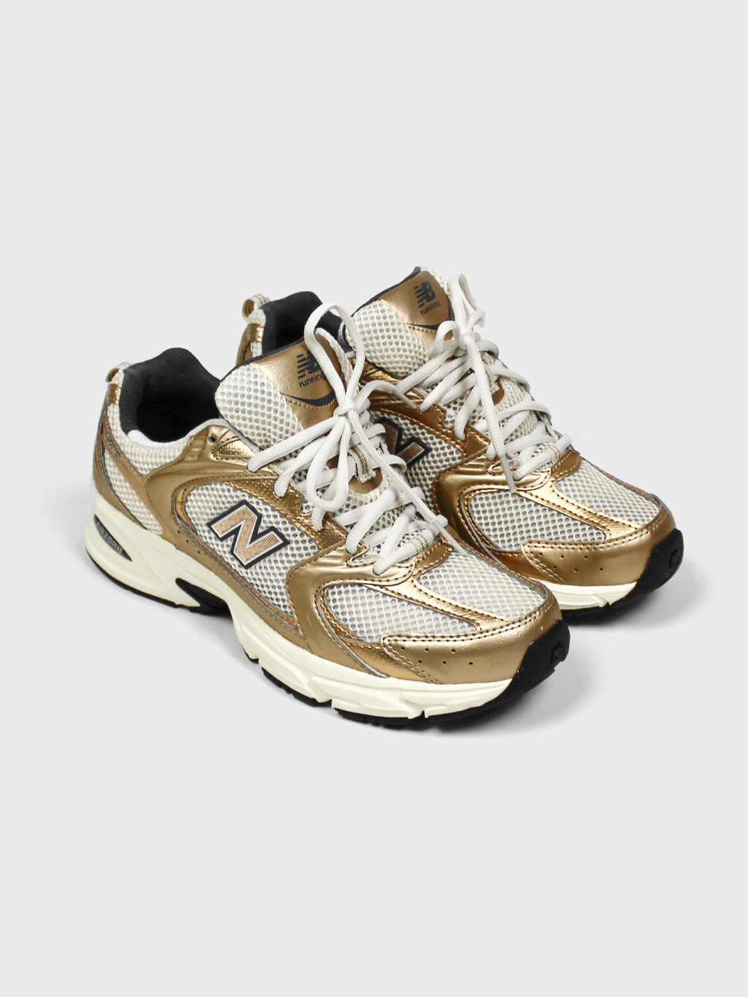 new balance 530 sneakers gold
