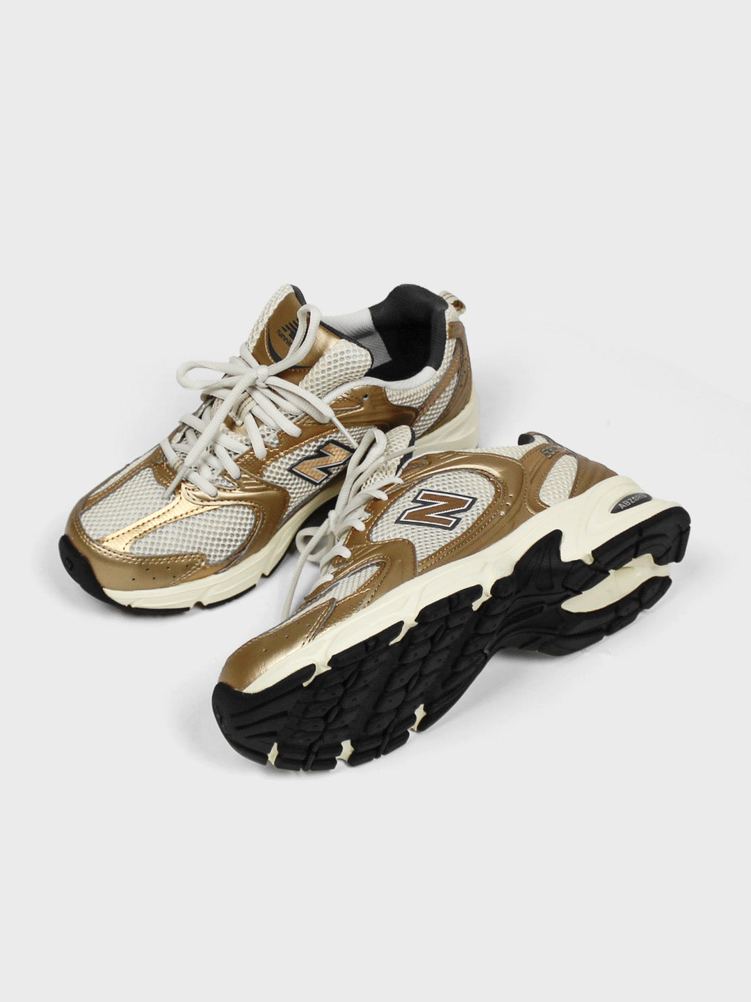 new balance 530 sneakers gold