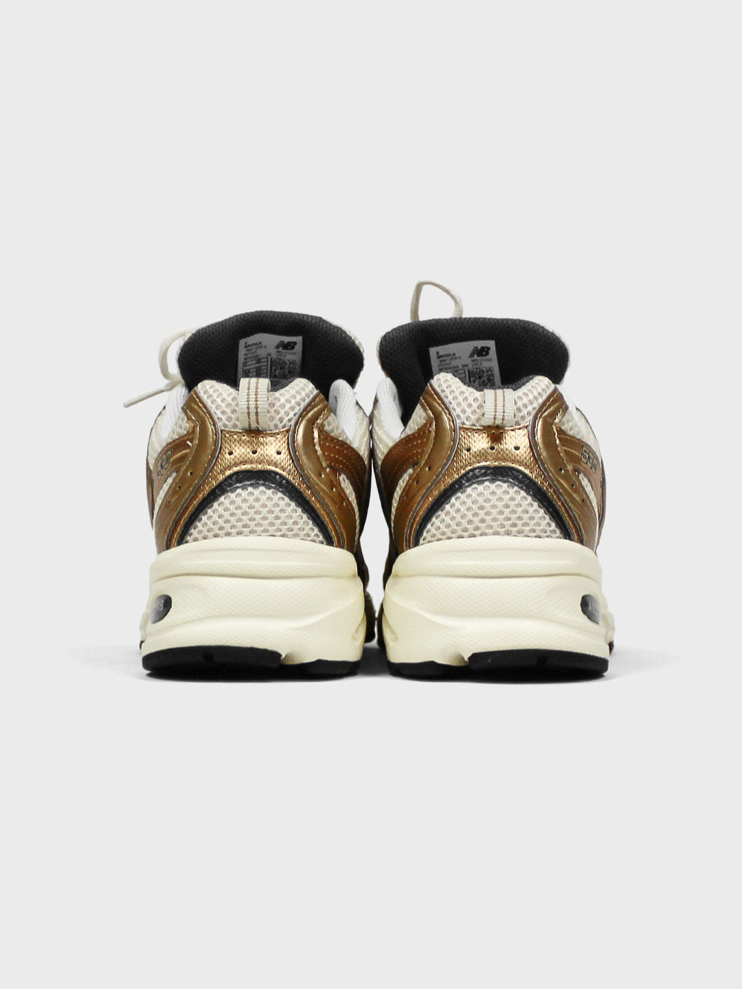 new balance 530 sneakers gold