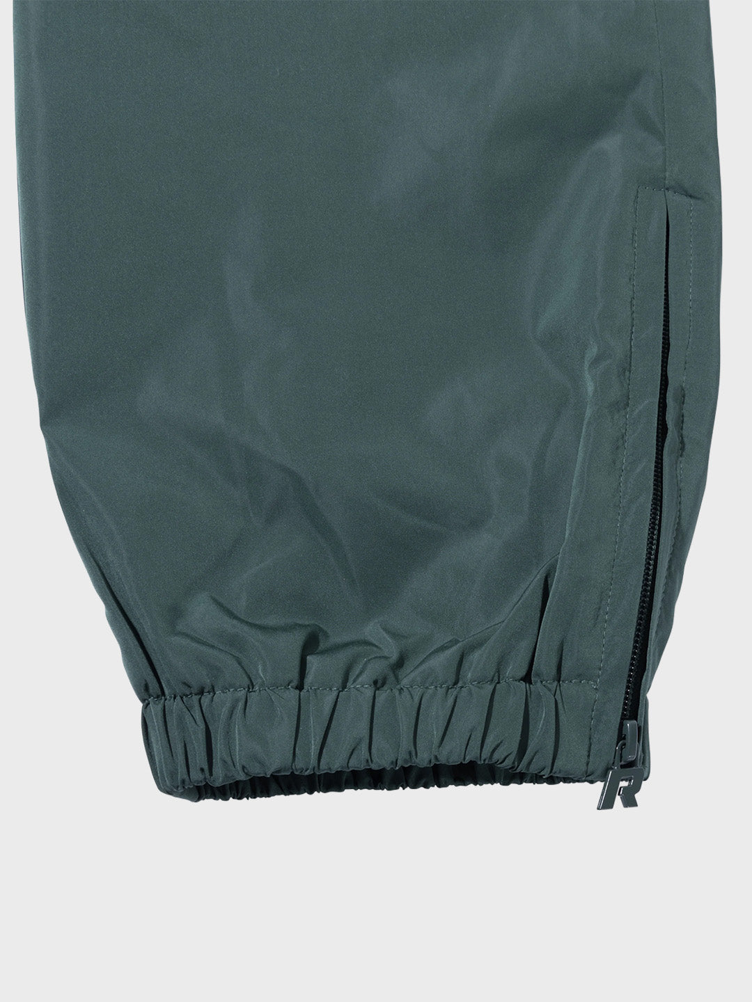 Rivero Unity Track Pants Green - close-up rits