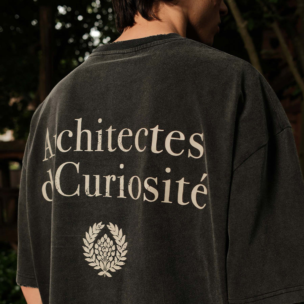 Close up van Don't Waste Culture t-shirt, backprint. Gedragen door model.