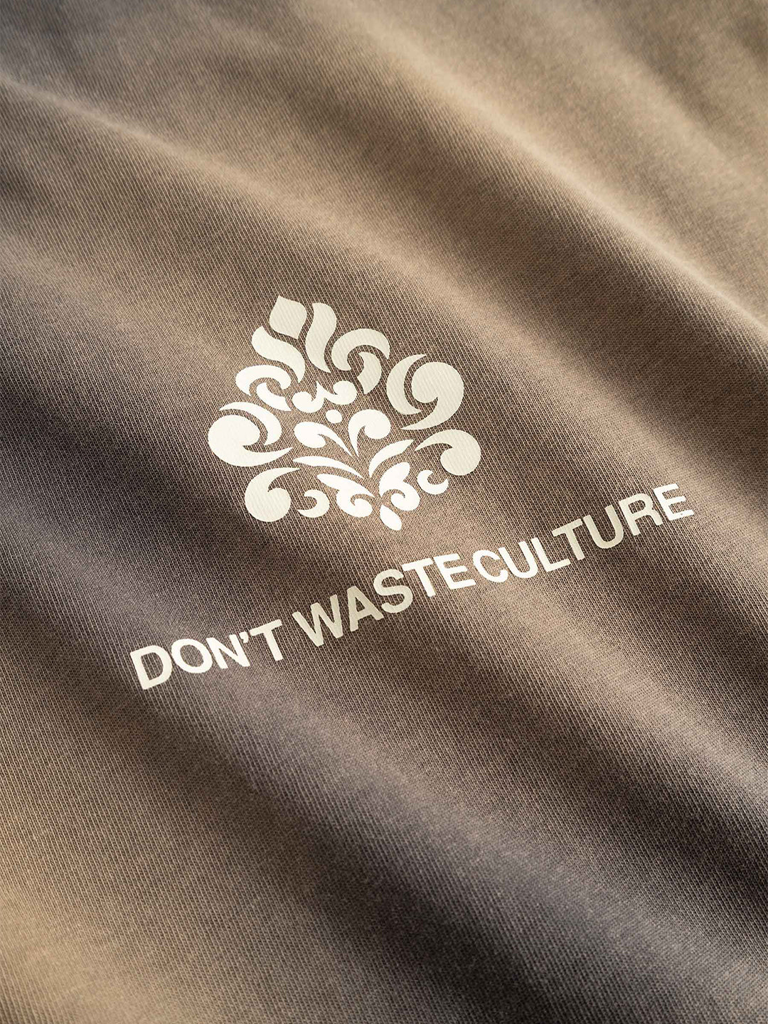 Don't Waste Culture Fade Longsleeve Grey - close-up logo