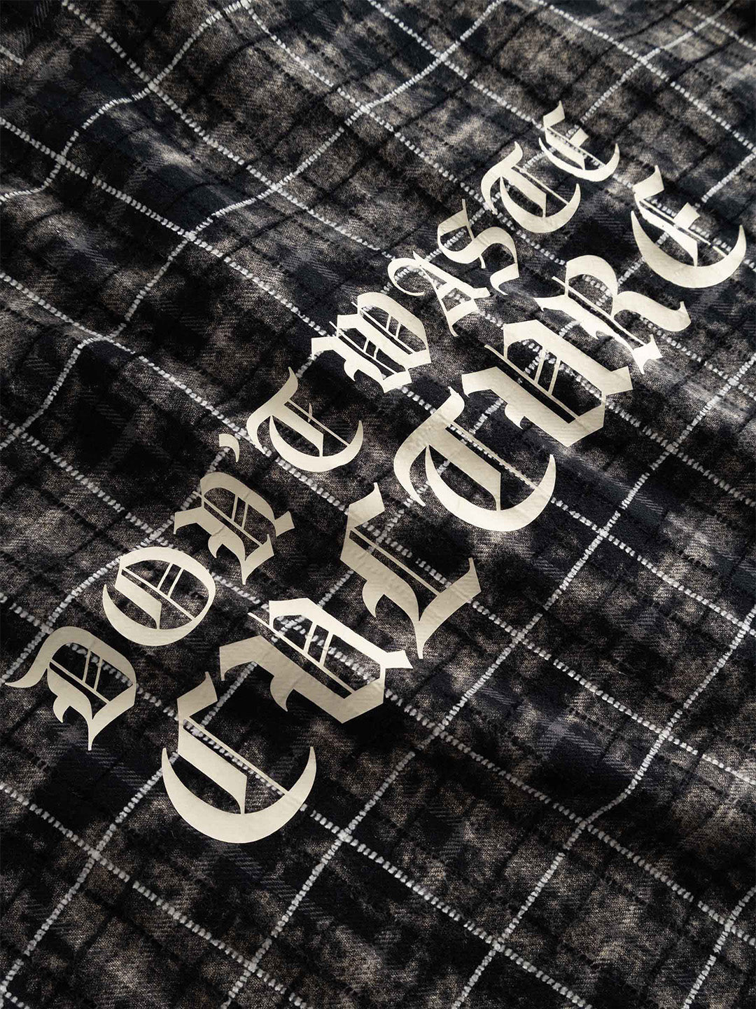 Don't Waste Culture Levi Shirt Black - close-up logo