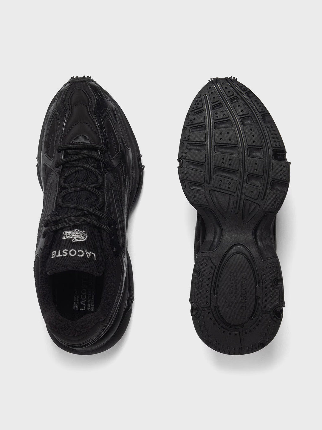 Bovenaanzicht en zool van Lacoste L003 2K24 sneakers Black