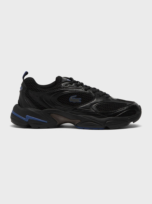 Zijkant van Lacoste Storm 96 sneakers in Black/Blue
