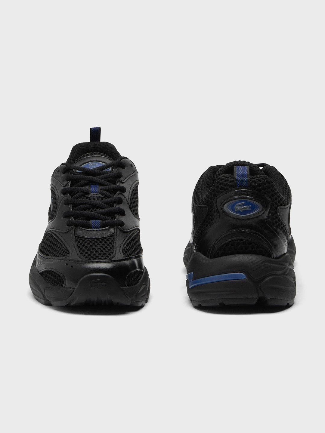 Close-up van hiel en neus Lacoste Storm 96 sneakers Black/Blue