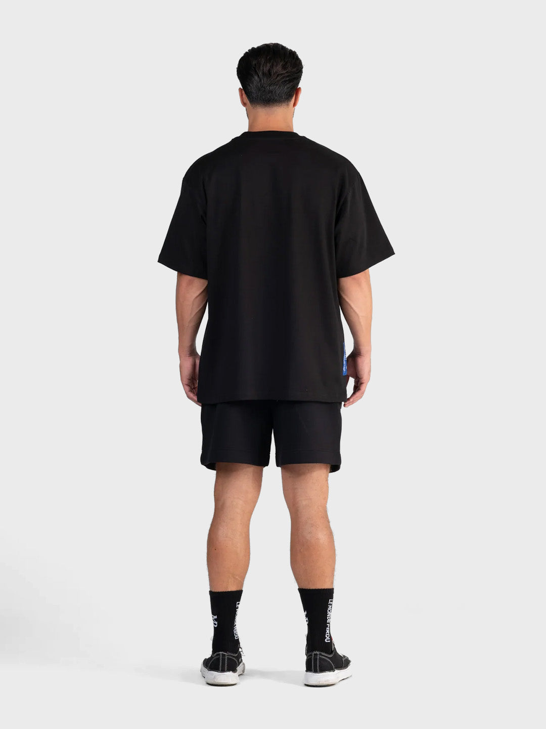 Le Monde Perdu Leaking Logo T-Shirt Black heren graphic t-shirt achterkant Reloadstore