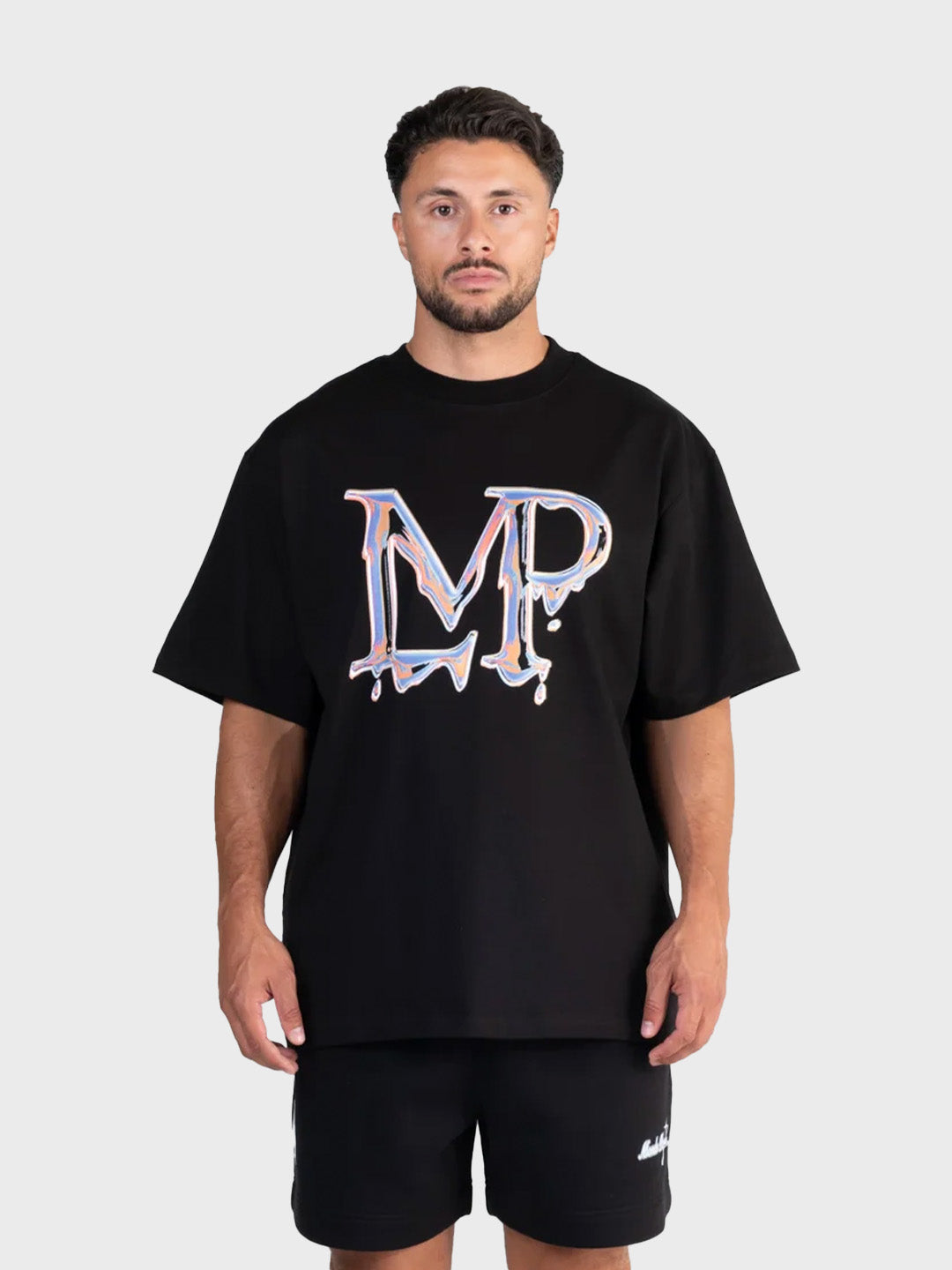 Le Monde Perdu Leaking Logo T-Shirt Black heren oversized t-shirt voorkant Reloadstore