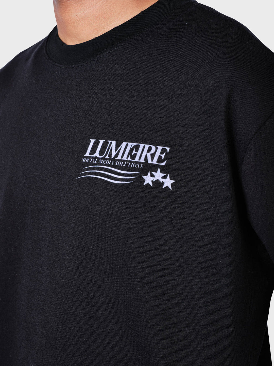 Lumi3re Solutions T-Shirt Black - close-up voorkant