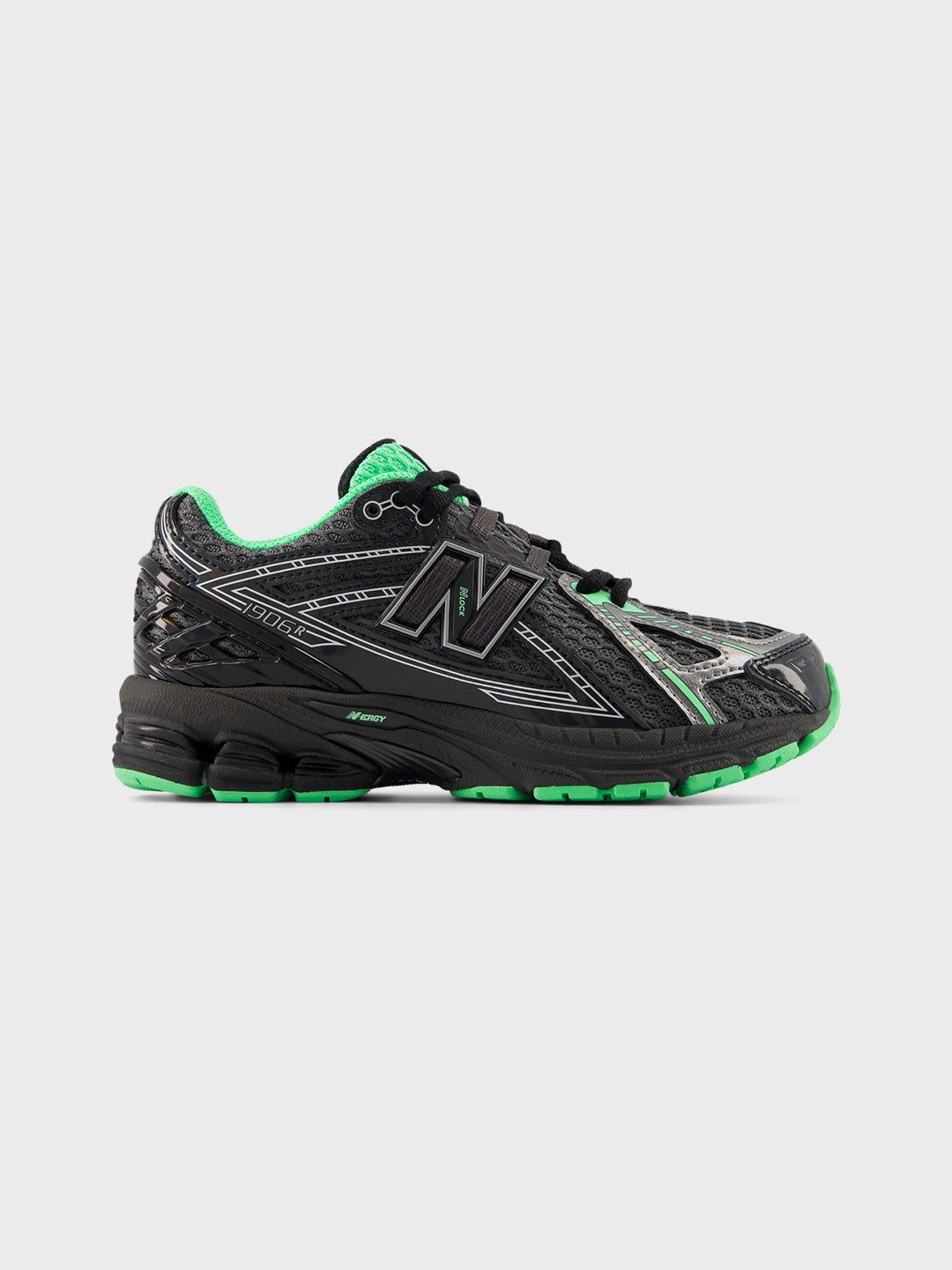 Zijaanzicht van de New Balance 1906 kids sneakers in black/lime leaf