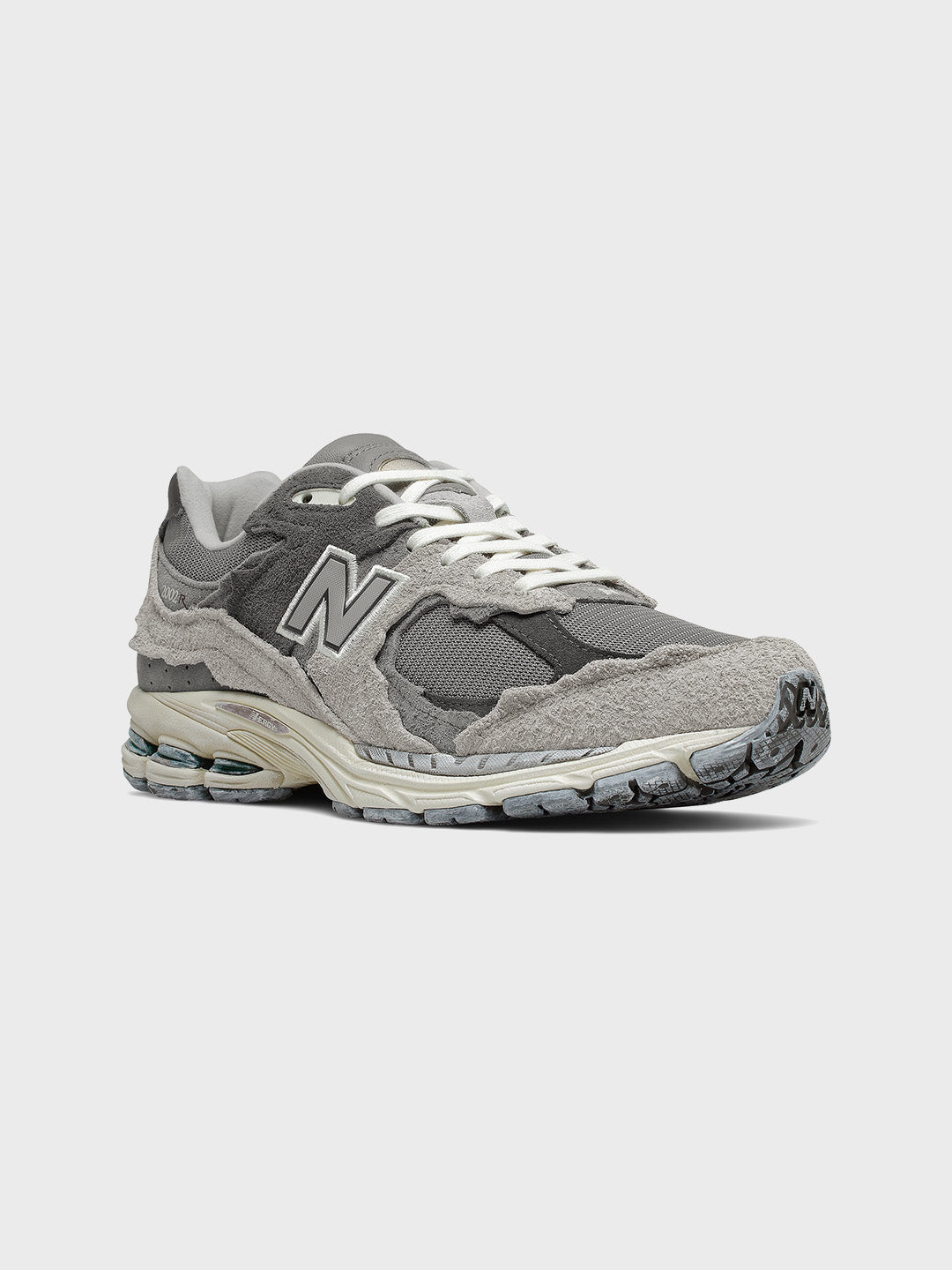 New Balance 2002R Protection Pack Sneakers Rain Cloud – schuin vooraanzicht