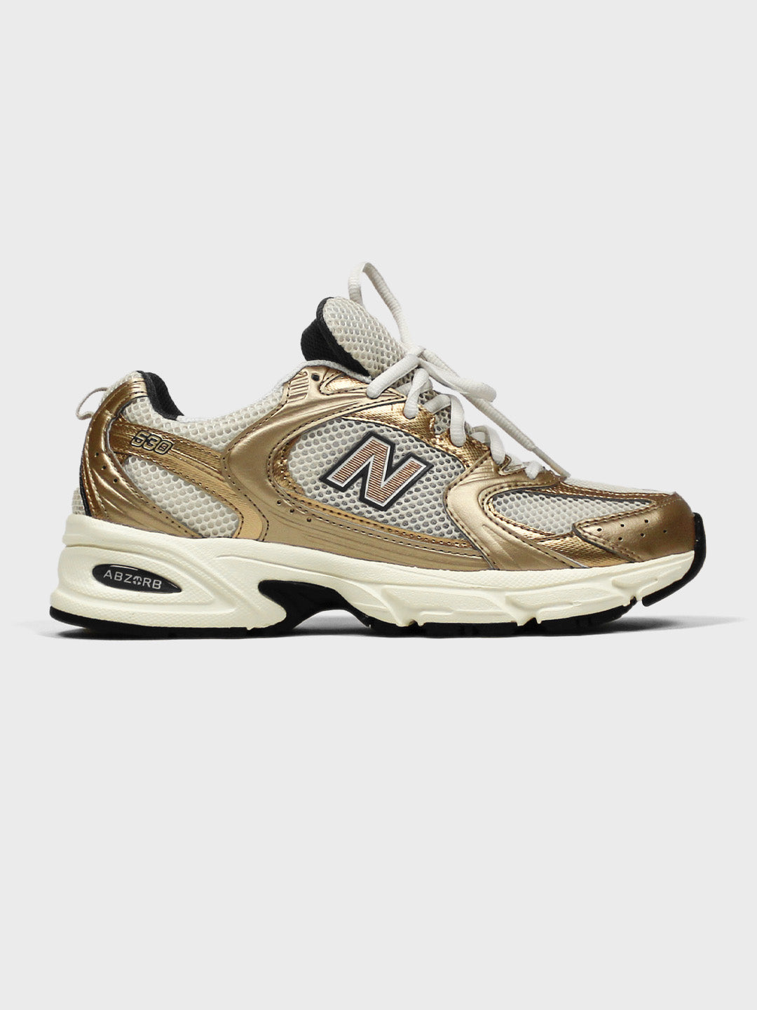 new balance 530 sneakers gold