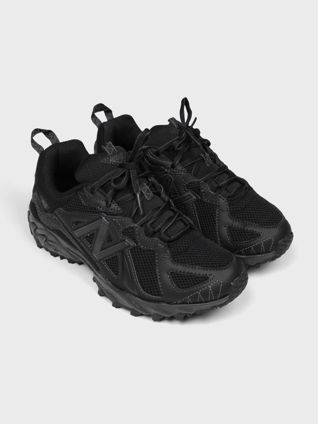 All black new balance best sale running shoes