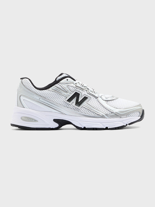 New Balance 740 sneaker in wit met zilver en zwarte accenten – zijaanzicht
