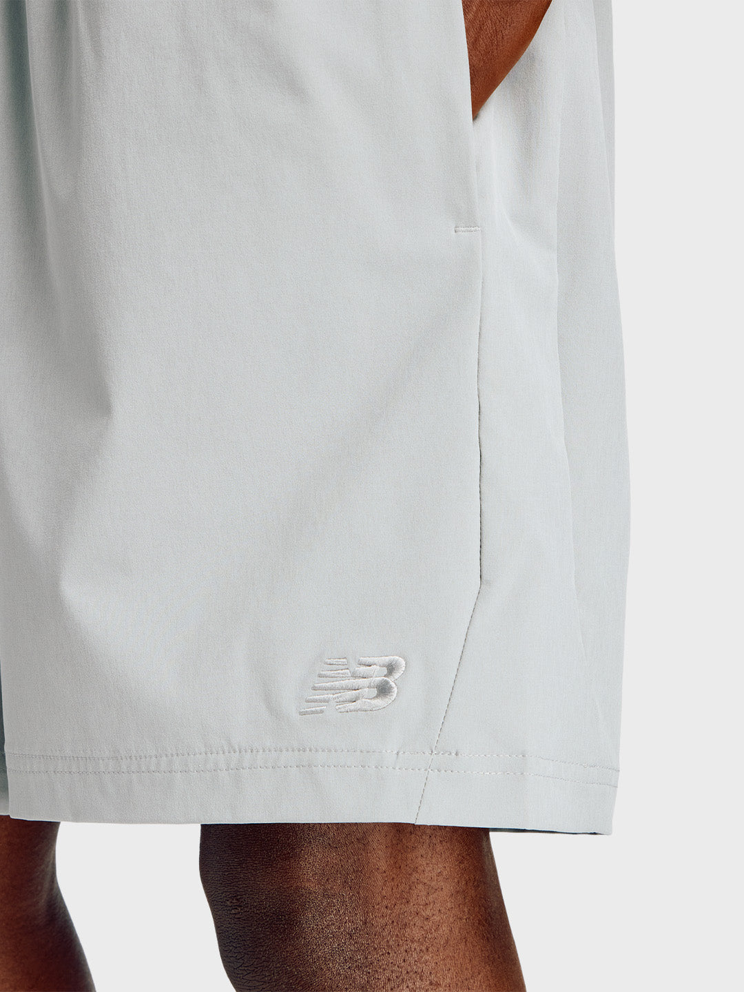 New Balance Athletics Woven Shorts Grey - close-up New Balance logo