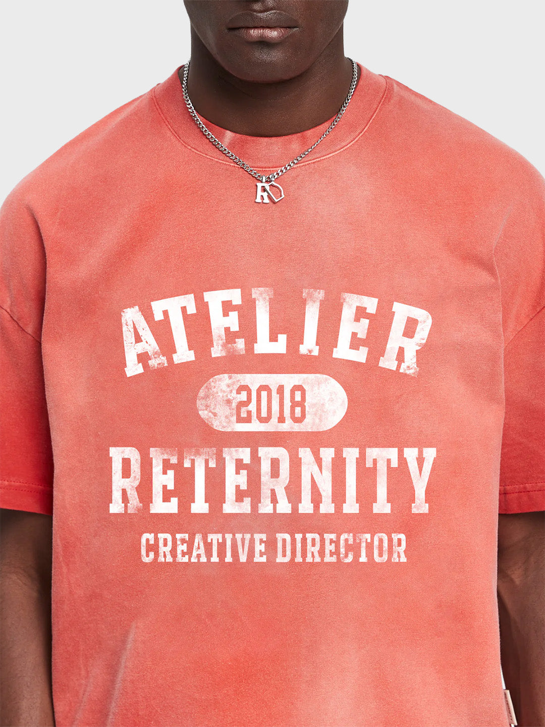 Reternity Atelier Emblem T-Shirt Bleached Red - close-up graphic