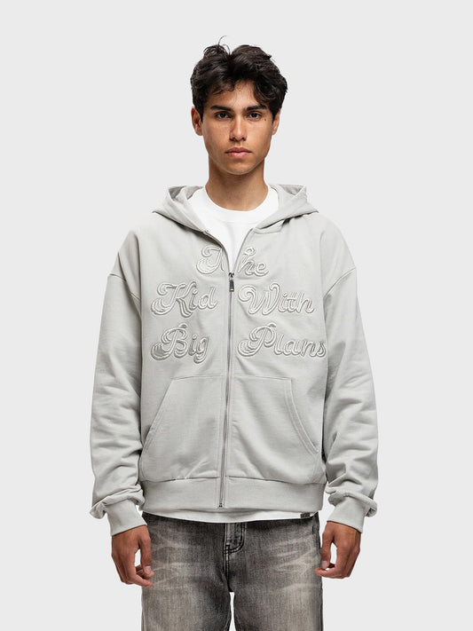 Model draagt Rivero Big Plans Hoodie Grey – vooraanzicht