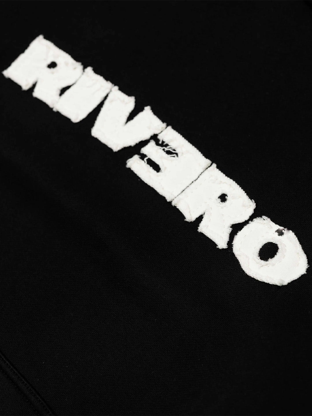 Rivero Frayed Echo Hoodie Black - close-up graphic