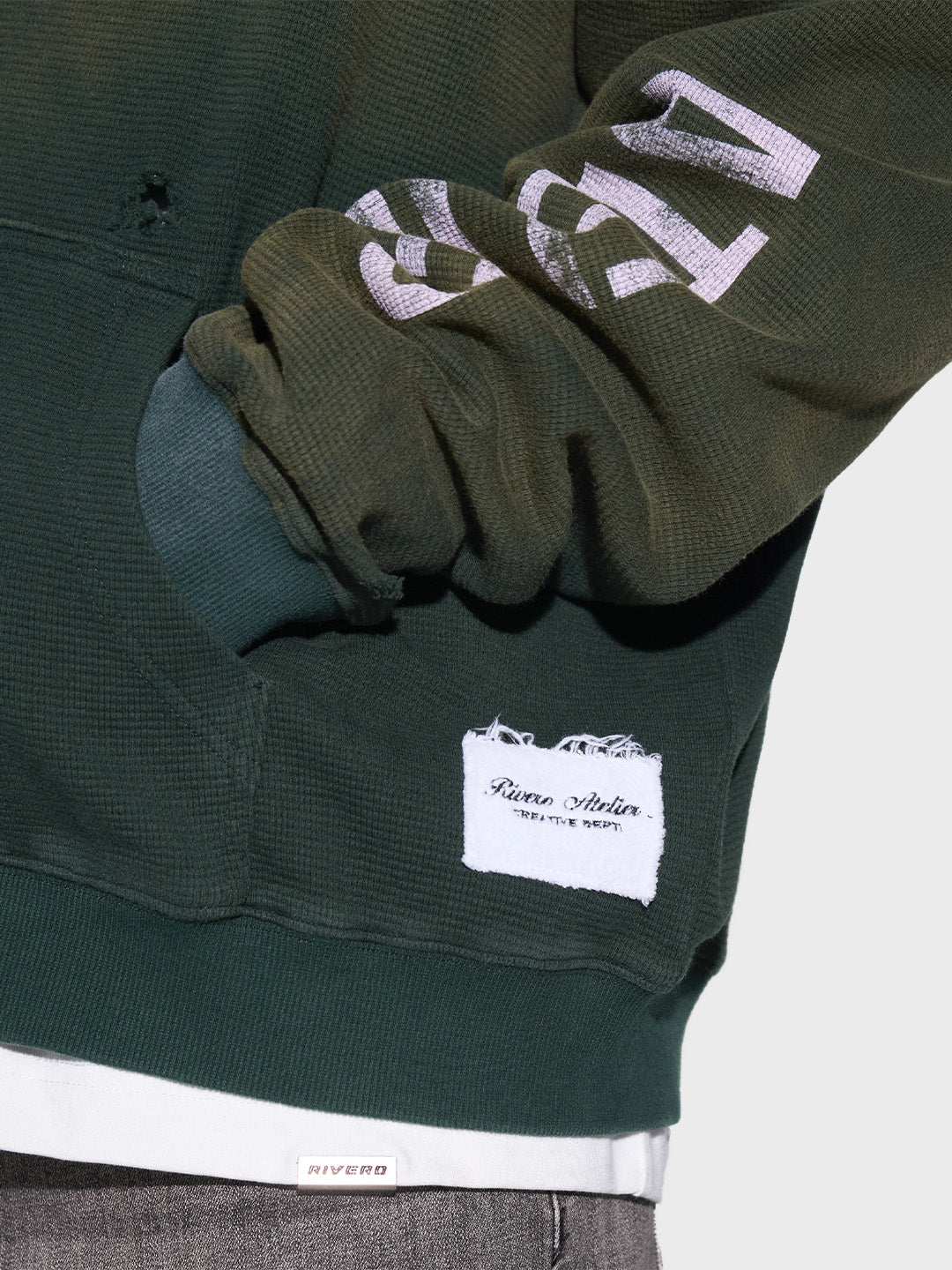 Close-up van 420 gsm wafelstof in washed green