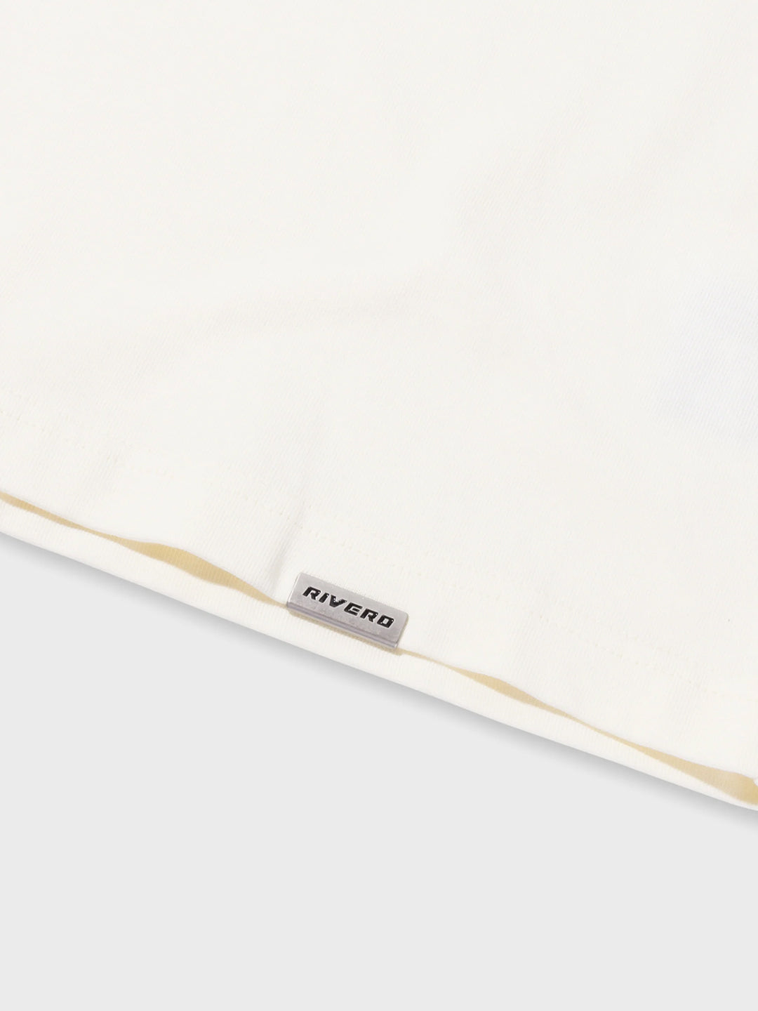 Rivero Puffed Logo T-Shirt Off-White - close-up Rivero patch