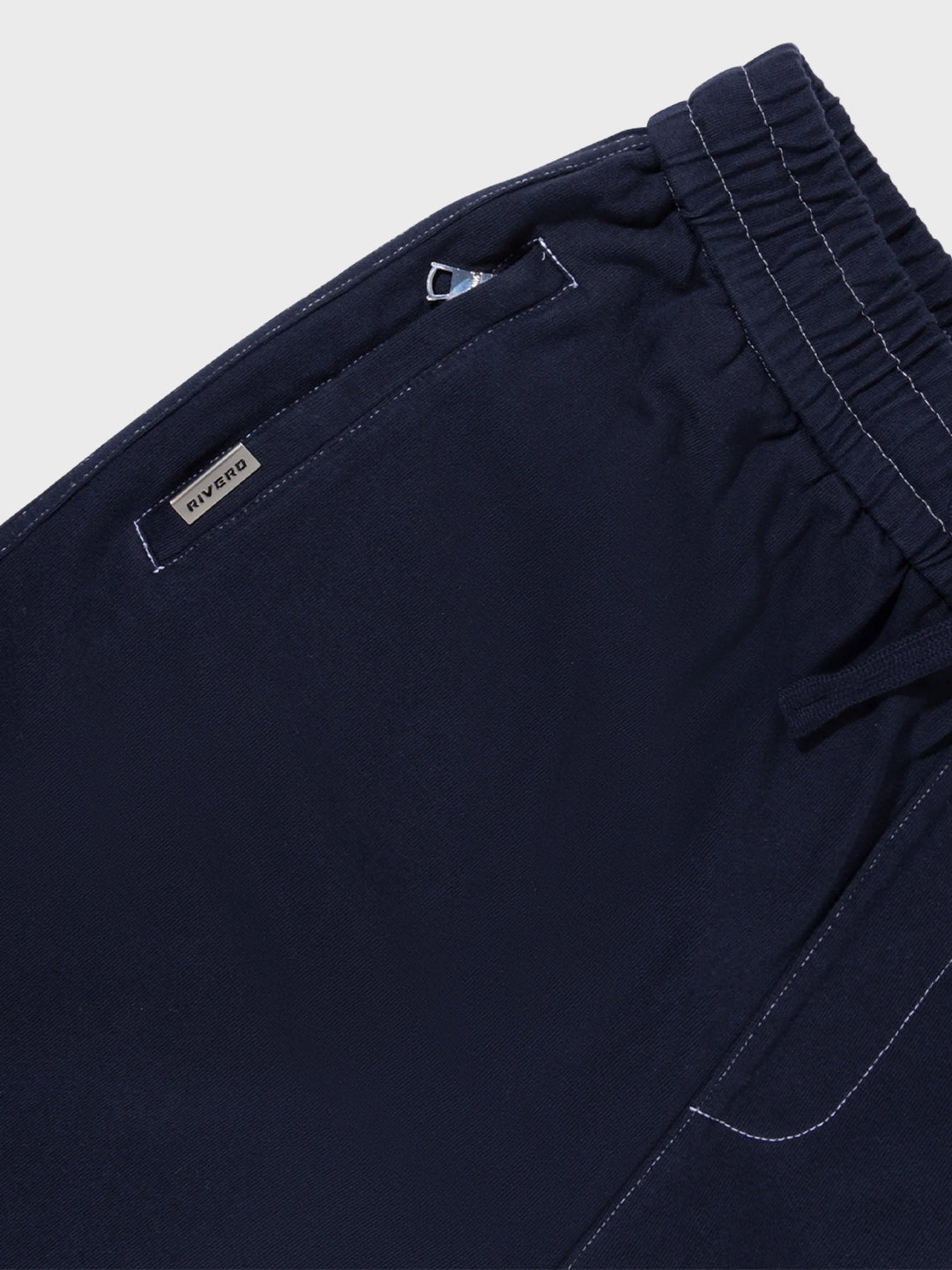 Rivero Seams Shorts Navy - close-up steekzak