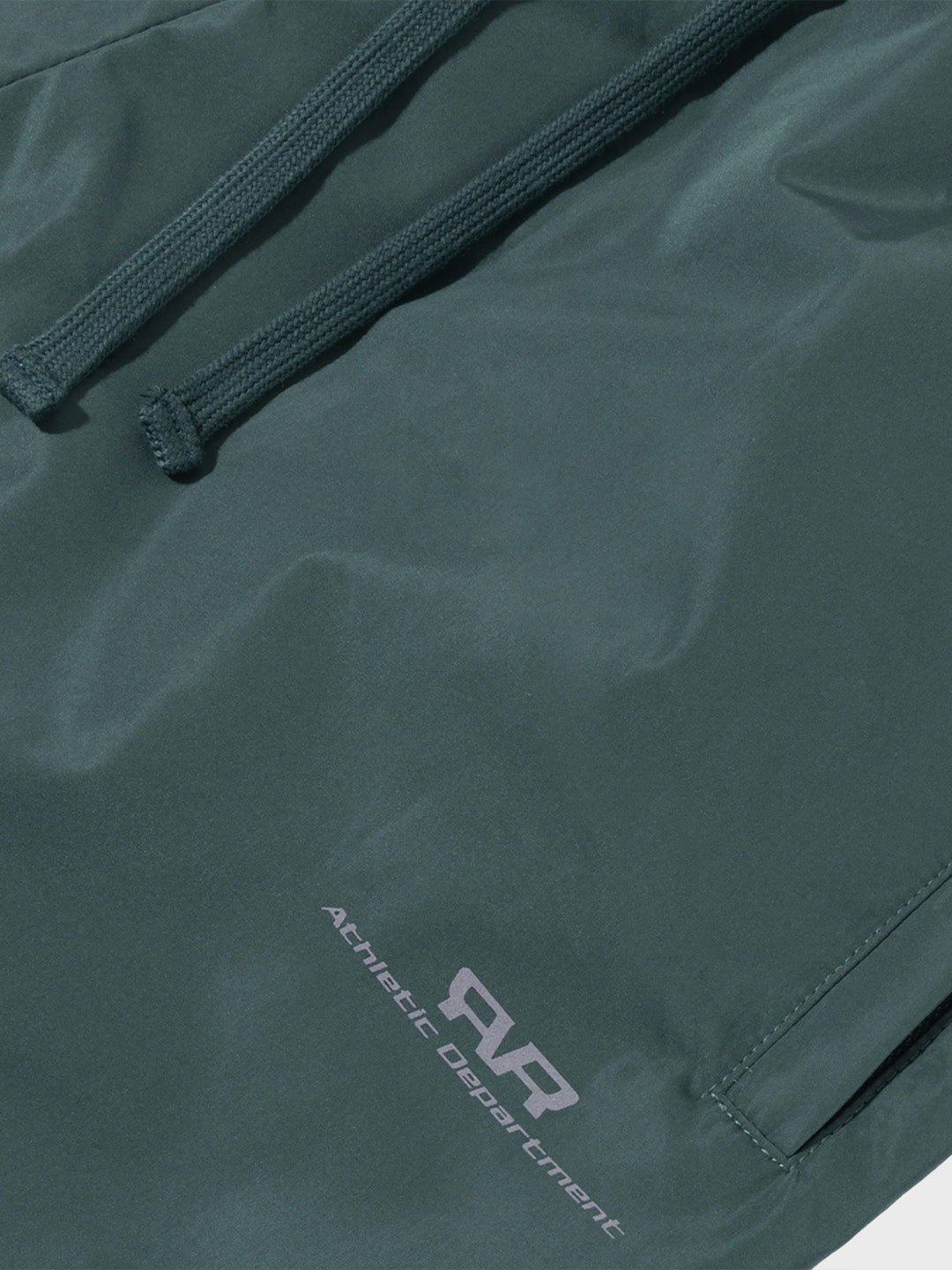 Rivero Unity Track Pants Green - close-up graphic