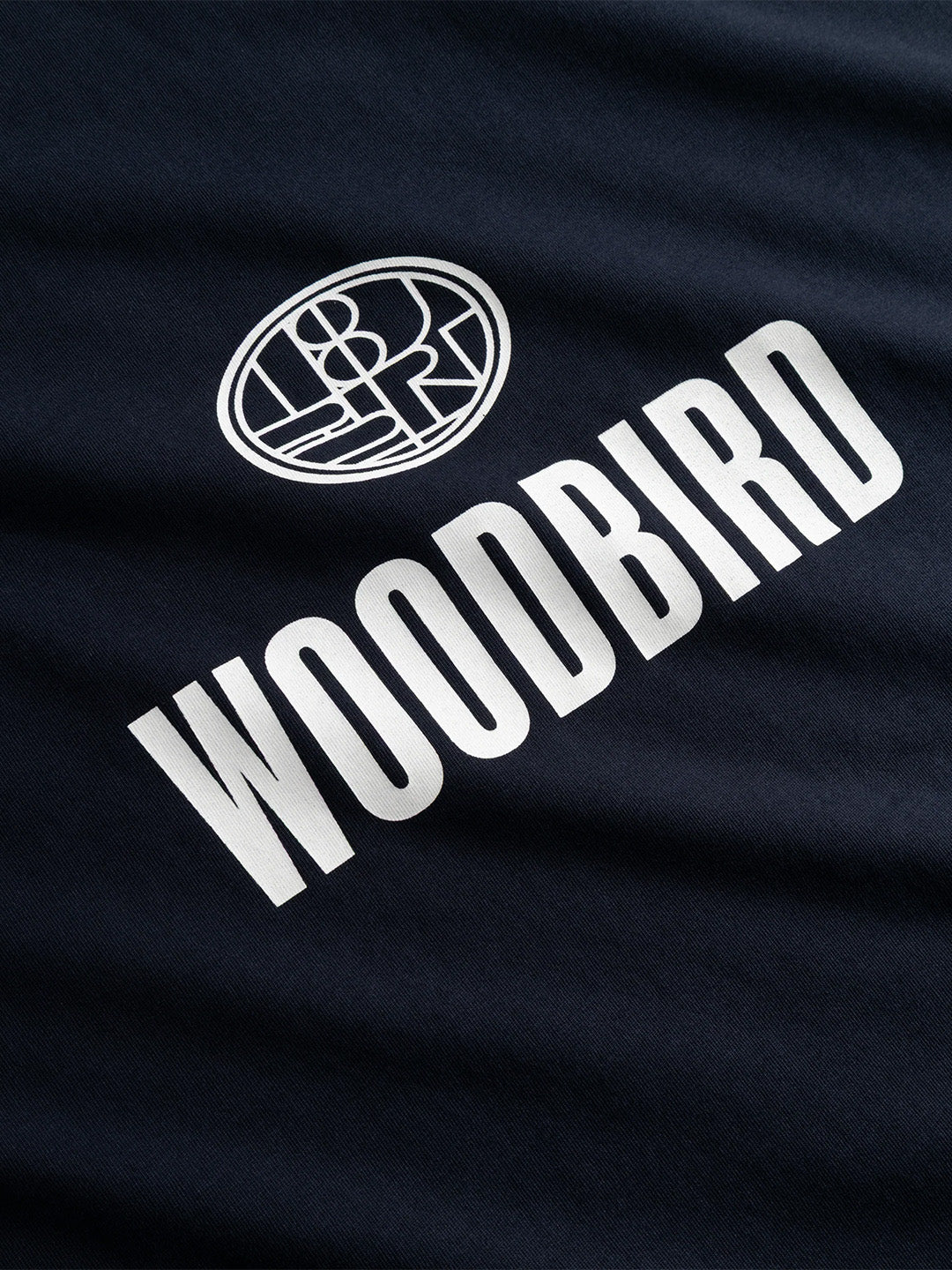 Woodbird WBBeam Nine T-Shirt in Dark Navy - close-up logo