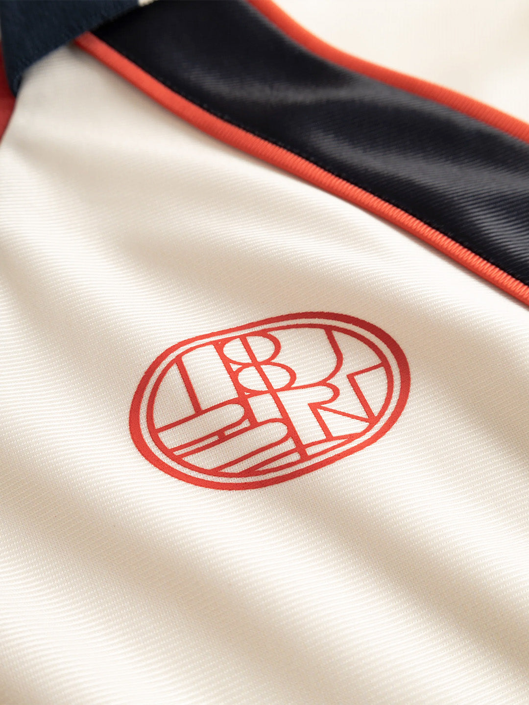 Woodbird WBTaka Sports Polo Off-White - close-up logo